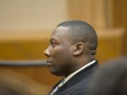 Former Beaverton police Officer Christopher Warren listens as a Clark County jury finds him guilty of first-degree child rape.