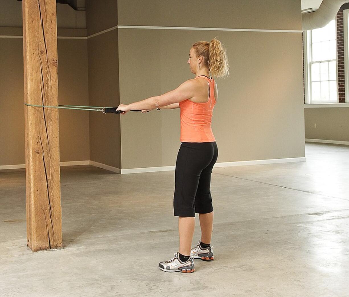 Standing tube pulls. Wrap a tube around a pole at about shoulder height.