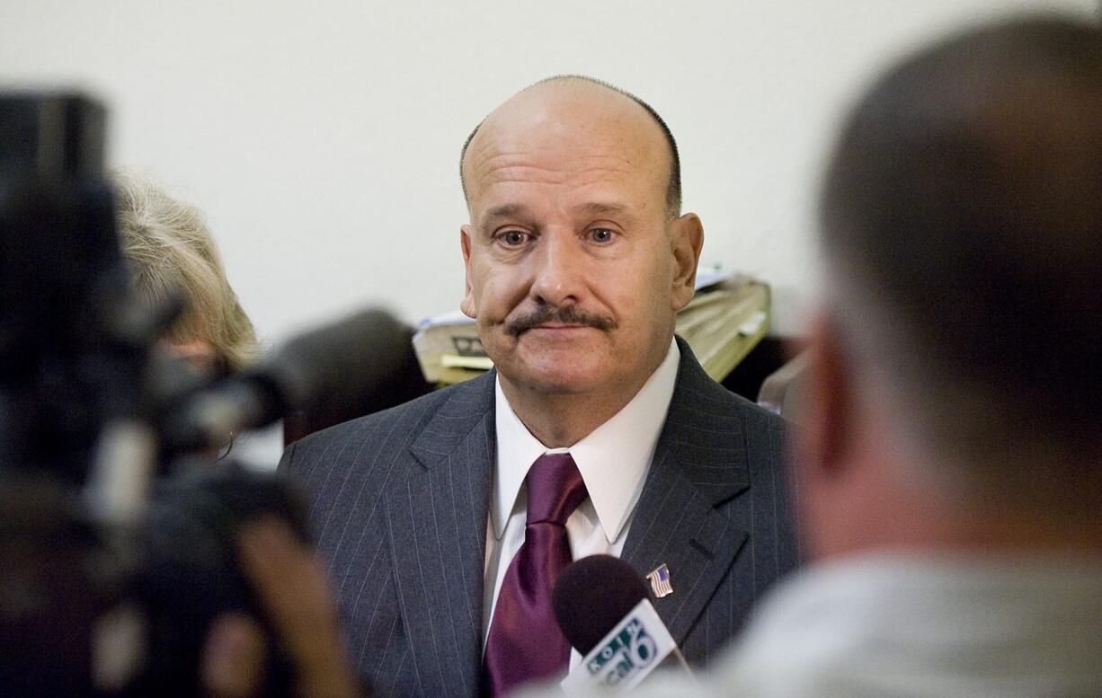 Clyde Ray Spencer talks to the media at the Clark County Courthouse after charges related to the sexual abuse of his children were dismissed Sept.