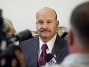 Clyde Ray Spencer talks to the media at the Clark County Courthouse after charges related to the sexual abuse of his children were dismissed Sept.