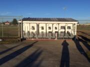 Two Fort Vancouver High School students were among a group of teens who painted this mural on the school's softball dugout in January at the request of the softball coach.