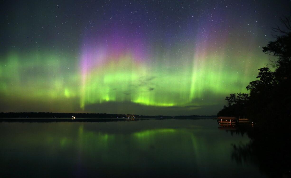 The Northern Lights paint the sky over Cotton, Minn., in 2012.