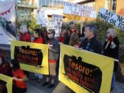 Opponents of the proposed oil terminal at the Port of Vancouver have staged public protests and have urged the Vancouver City Council to take a stand against the Tesoro-Savage proposal.