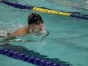 CHS senior Xiaguang Yan helped the Papermakers win the district 200 freestyle relay Saturday, in Kelso.