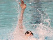 Kasey Calwell clinched second place for Camas in the 200 individual medley (above) and the 100 breaststroke at the 4A boys state swimming championships Saturday, at the King County Aquatic Center in Federal Way.