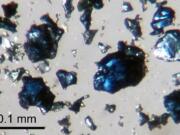 Steve Jacobsen/Northwestern University
Crystals of blue hydrous ringwoodite, synthesized in a high-pressure lab experiment, were used to help identify the diamond in the Earth's mantle. The discovery may help us to better understand the mechanics of earthquakes and volcanoes.