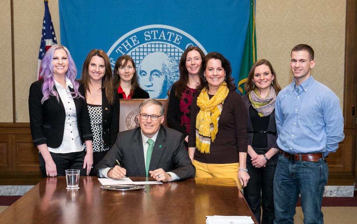 Gov. Jay Inslee signed Substitute Senate Bill No. 6069, relating to community custody conditions for sex offenders, on  March 17. The bill was sponsored by Sen. Ann Rivers, after she was contacted by Camas sisters Kimberly Abell and Jennifer Chilton. Pictured above at the signing are Abell, Chilton, Tamara Linder (session intern), Gov. Inslee, Liz Coleman (legislative assistant), Sen.