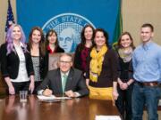 Gov. Jay Inslee signed Substitute Senate Bill No. 6069, relating to community custody conditions for sex offenders, on  March 17. The bill was sponsored by Sen. Ann Rivers, after she was contacted by Camas sisters Kimberly Abell and Jennifer Chilton. Pictured above at the signing are Abell, Chilton, Tamara Linder (session intern), Gov. Inslee, Liz Coleman (legislative assistant), Sen.