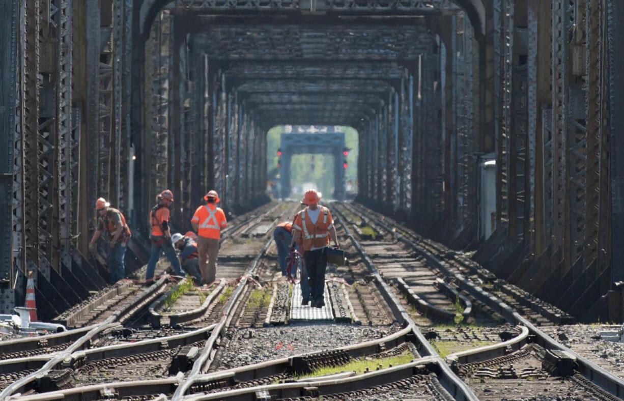 Workers for BNSF Railway are turning their attention to improving tracks, signals, and switches from Vancouver's Amtrak station to the aging Columbia River railroad bridge.