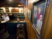 A family photo of Rosemary Teel, Jane Wiger, Ron Wiger and Alan Teel - operators of Bill's Chicken and Steak House - hangs in the dinning room. The venue has sold after 49 years of business in Vancouver at the corner of St.