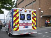 An AMR ambulance crew arrives to a call at the Clark County Jail in October.