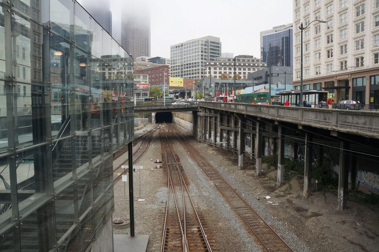 Files/McClatchy-Tribune
Seattle's emergency management director testified in the Senate on Wednesday that three crude oil trains a week are passing through downtown Seattle, seen here in October, but that frequency could increase to three a day once refineries in the state are ready to receive them.