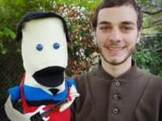 Vancouver School of Arts and Academics' Ryan Hanrahan, 17, shows a puppet likeness of Danny Weinkauf, the bass player for the band They Might Be Giants, who hired the teen to make a humorous sock puppet music video for the musician's upcoming kids album.