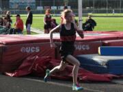 Courtney Owens kicks to the finish line first in the 3,200-meter run Thursday, at Longview Memorial Stadium.