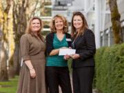 Hudson's Bay: Parks Foundation marketing associate Sherry Thompson, left, and executive director Cheri Martin with Kathy Webb of Nike.