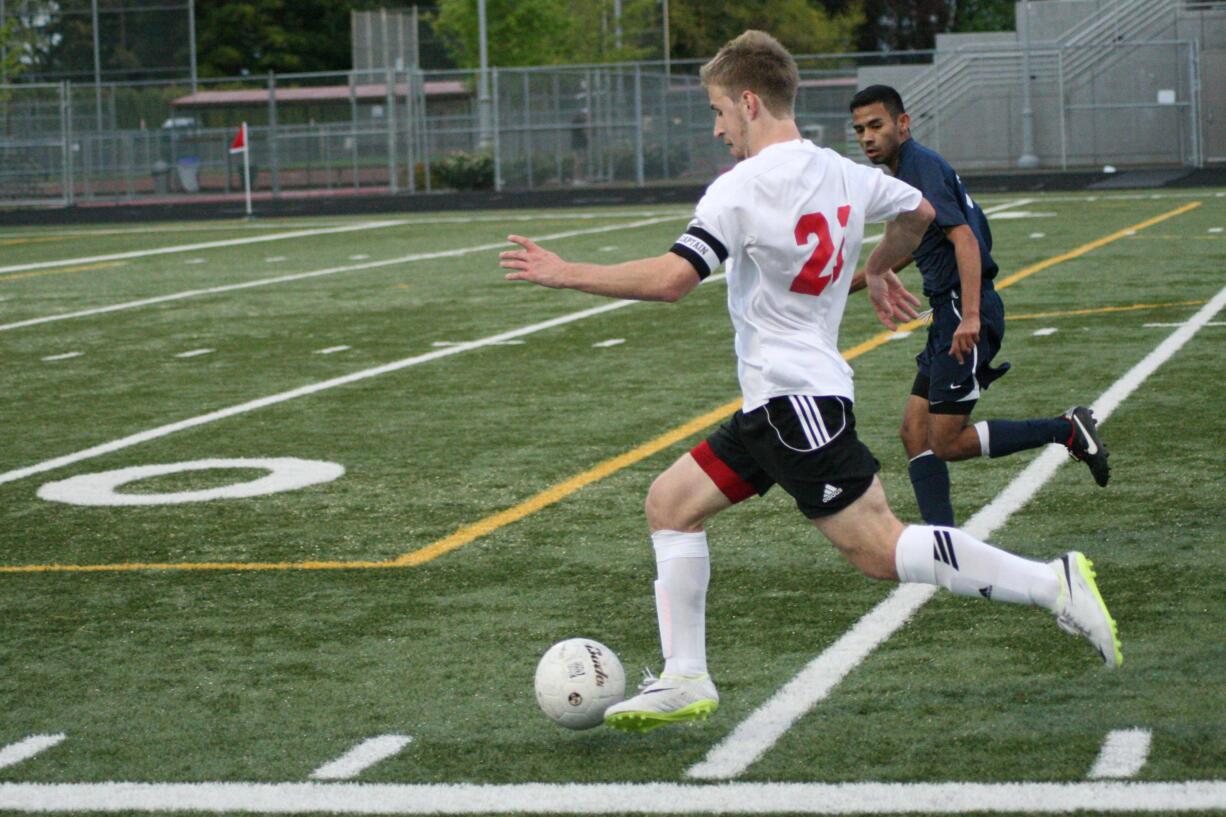 Nate Beasley breaks loose with the soccer ball Friday, at Doc Harris Stadium. Beasley and Cameron Eyman netted goals, but Skyview equalized Camas' effort.