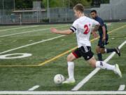 Nate Beasley breaks loose with the soccer ball Friday, at Doc Harris Stadium. Beasley and Cameron Eyman netted goals, but Skyview equalized Camas' effort.