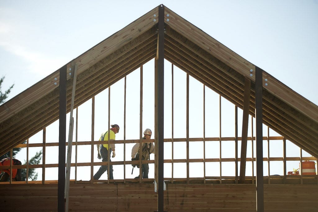 Construction workers expand Columbia Presbyterian Church in November.