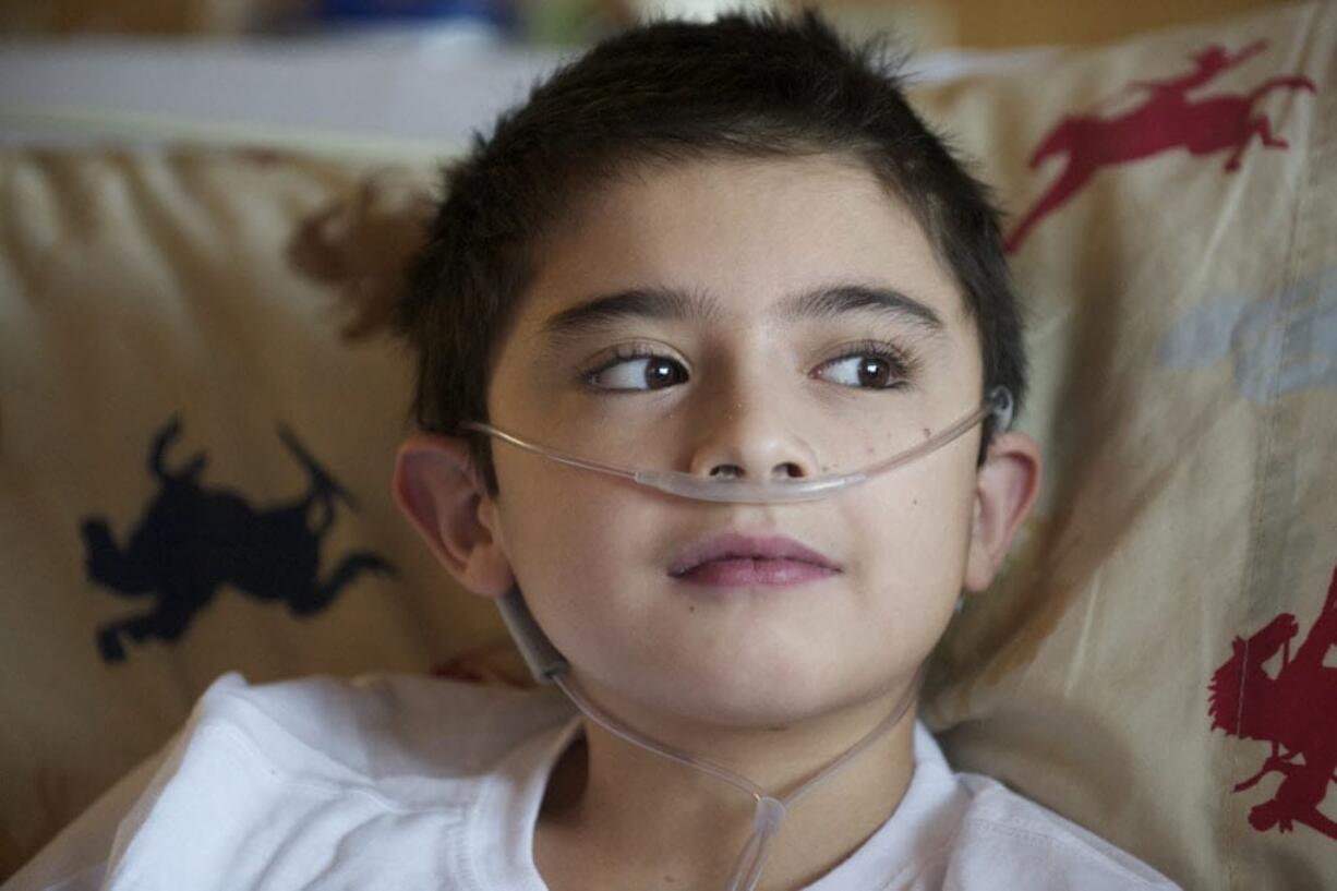 Photos by Steve Lane/The Columbian files
Alex Campbell of Vancouver learned in December that he needed a double lung transplant. The 9-year-old -- shown here in January -- has been waiting for lungs at Texas Children's Hospital in Houston since February.