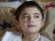 Photos by Steve Lane/The Columbian files
Alex Campbell of Vancouver learned in December that he needed a double lung transplant. The 9-year-old -- shown here in January -- has been waiting for lungs at Texas Children's Hospital in Houston since February.