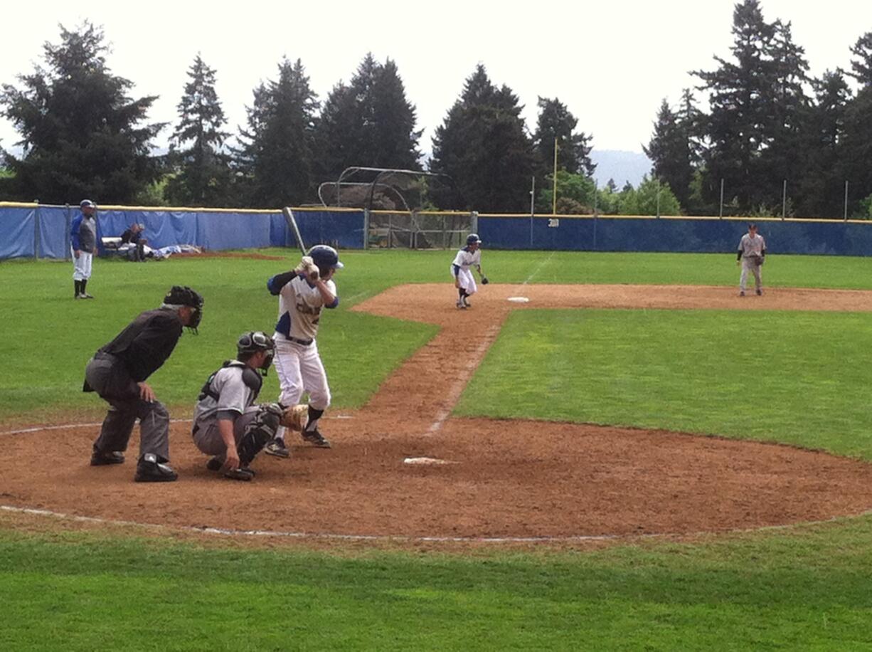 Michael Gonzalez bats for Clark College while Justin Juarez takes a lead off third base Saturday against Mt.