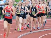 Alexa Efraimson breaks away from the pack during the Jesuit Twilight Elite 1,500-meter race Friday. The Camas High School junior crossed the finish line first with a time of 4 minutes, 21.1 seconds.