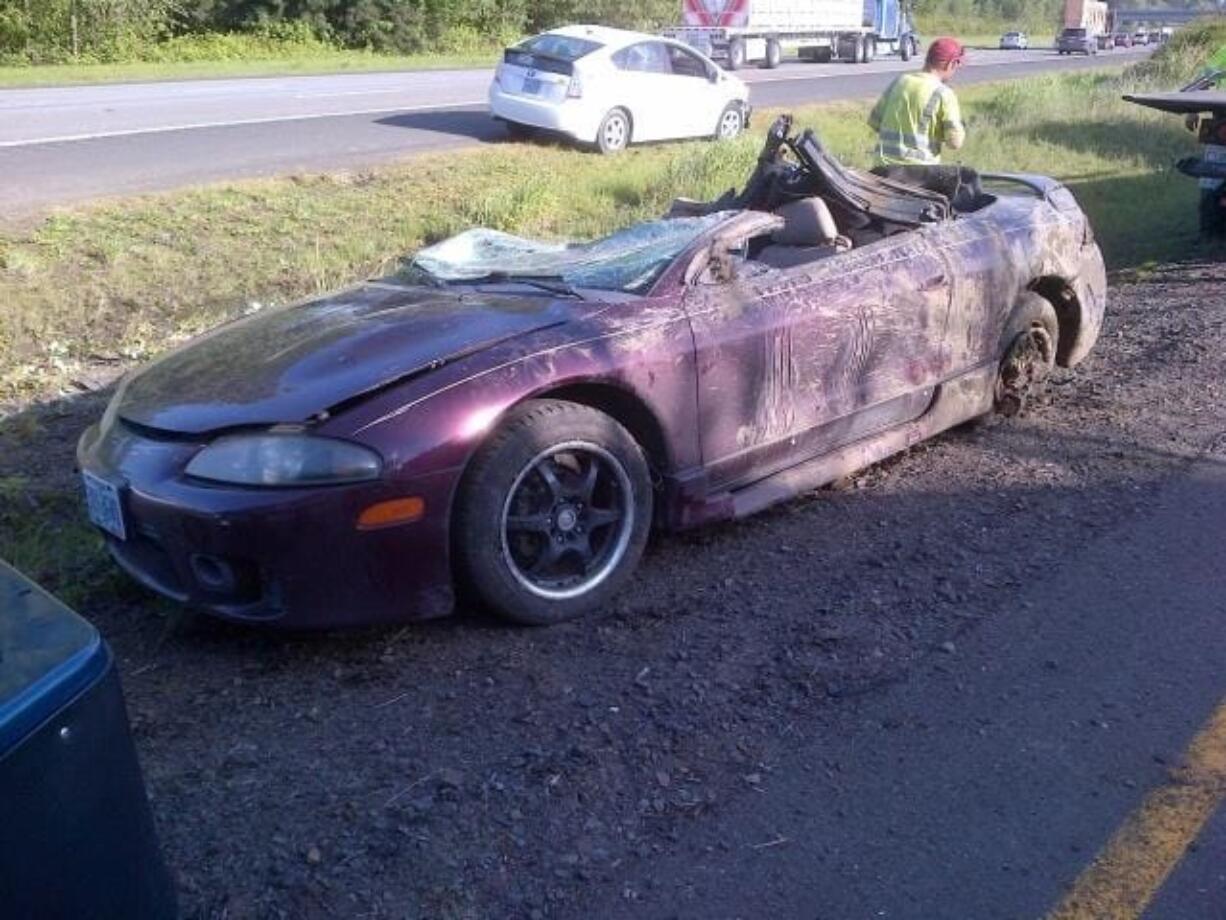 A Mitsubishi Eclipse convertible crashed on Interstate 5 south of Ridgefield after clipping a Toyota Prius and swerving onto the right shoulder.