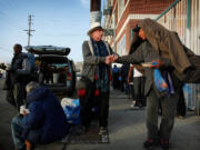 Jeff Dietrich and Catherine Morris came to skid row to help ease despair.