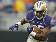 Washington's Bishop Sankey was the first running back taken in the 2014 NFL draft, picked by the Tennessee titans with the 54th overall pick. (AP Photo/Ted S.