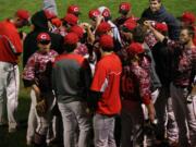 Joe Hallead leads the Papermakers in one more rally cry during the district tournament May 6, at Propstra Park.