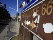 Signs indicating the old route in Barstow reminds motorists of Route 66, &quot;America's Highway.&quot; As the number of tourists attracted by the historic roadway dwindle, merchants along the route must find new ways to attract visitors.