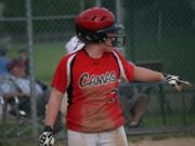 Hannah Welborn points to Katie Schroeder after scoring a big run for the Camas softball team in the seventh inning.