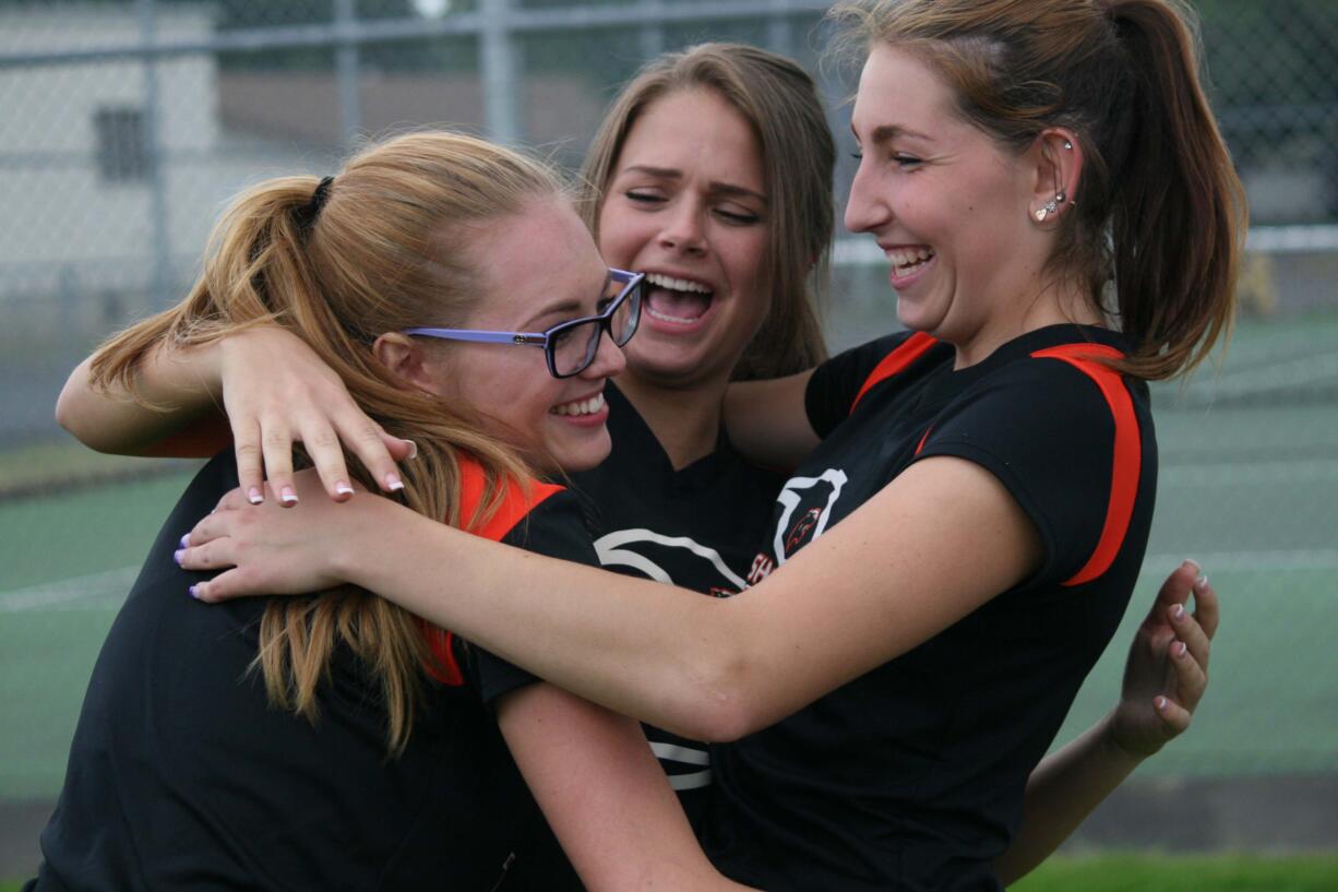 Washougal girls tennis players Amelia Quatermass, Christina Zack and Haley Briggs captured sub-district championships Saturday, at R.A.