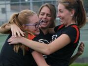 Washougal girls tennis players Amelia Quatermass, Christina Zack and Haley Briggs captured sub-district championships Saturday, at R.A.