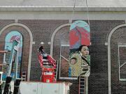 The final Vancouver School of Arts and Academics Confluence Project triptych of mosaic artwork was installed Tuesday morning on the exterior of the school.
