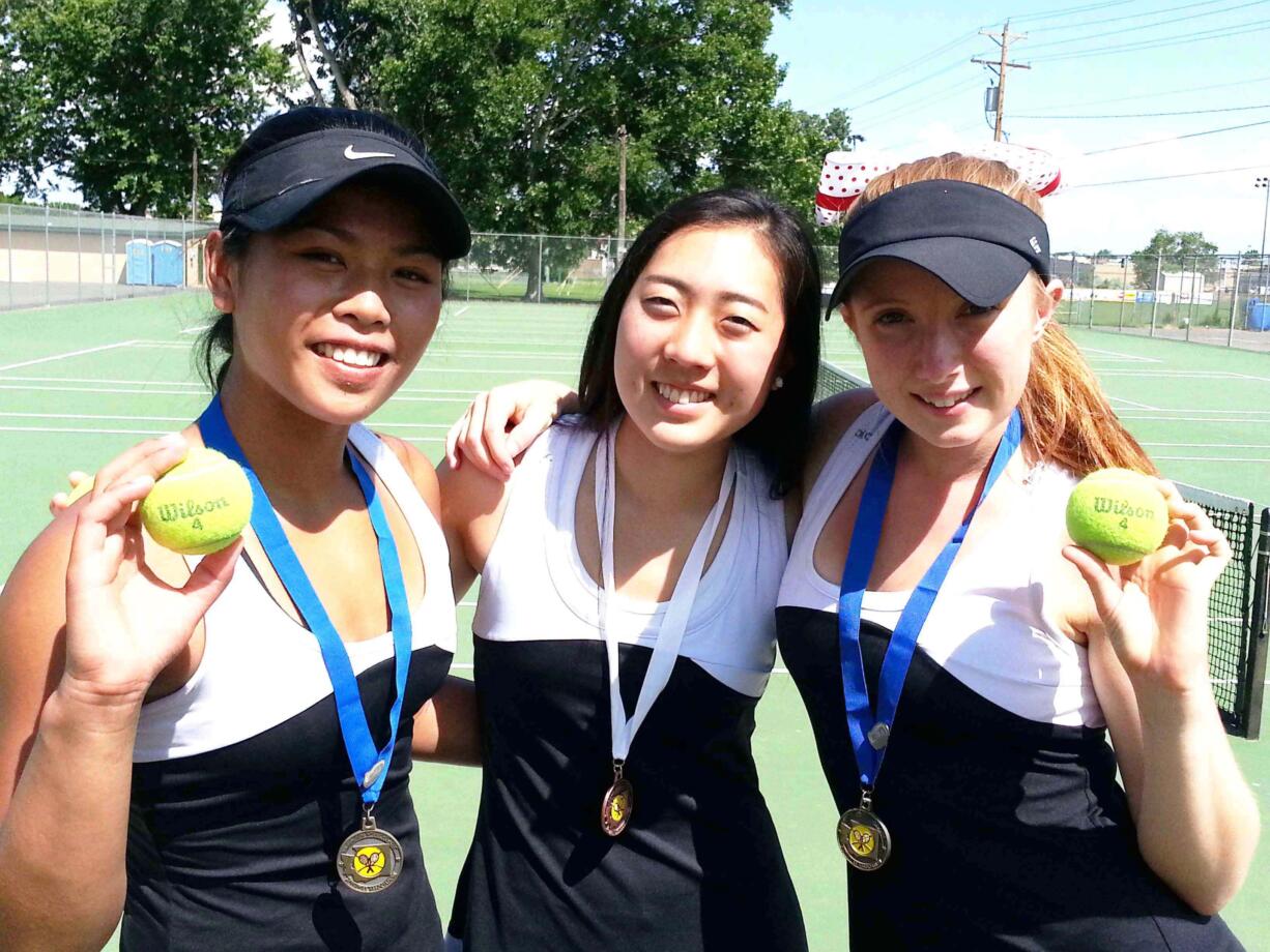 Camas girls tennis players Hannah Gianan, Esther Kwon and Jen Lewis led the Papermakers to third place at the state tournament, in Richland. Gianan and Lewis earned the doubles championship.