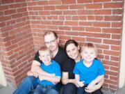 Jack Conover, 7, left; his dad, Kris Anderson; his mom, Kelly Conover and his 4-year-old brother Patrick Anderson.