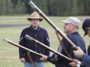 Columbian files
Mike Twist, National Park Service guide, trains volunteers at Fort Vancouver during black-powder weapon training.