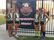 Evergreen Storm Track Club runners Emily Wilson, Brooklyn Jackson, Kaylee Merritt and Presley Timmons (left to right) show off their third-place medals from 3,200-meter relay race July 23, at the National Junior Olympic Championships, in Humble, Texas.