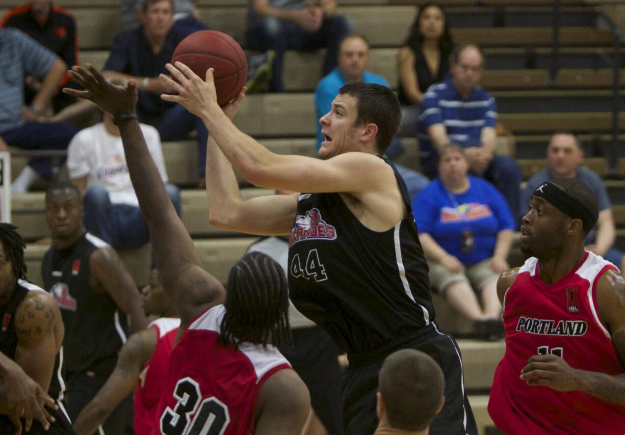 Vancouver Volcanoes forward Adam Herman shoots against the Portland Chinooks.