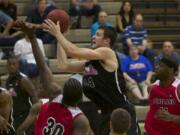 Vancouver Volcanoes forward Adam Herman shoots against the Portland Chinooks.