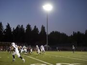 Chiawana runs a play in the first half against Camas at Doc Harris Stadium on Friday September 5, 2014.