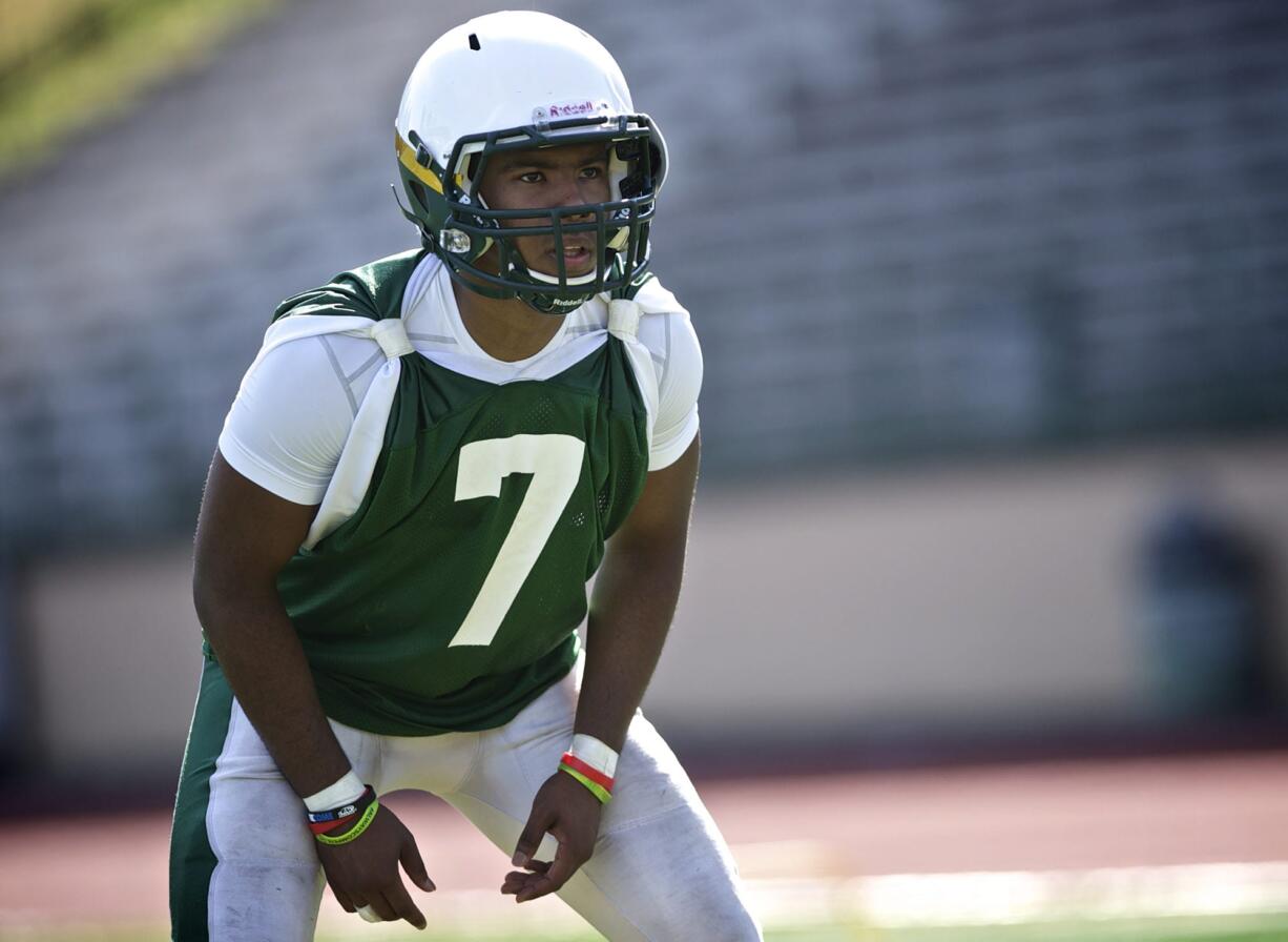 Zachary Kaufman/The Columbian
Rey Green and the Evergreen Plainsmen kick off the prep football schedule with a 5 p.m. game today against Eisenhower of Yakima at McKenzie Stadium.