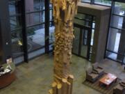 Esther Short: Artist Vicki Lynn Wilson transformed a pillar in the lobby of Vancouver City Hall into a temporary sculpture called &quot;Strata.&quot; The sculpture, along with mixed-media art pieces by Greg Bee, are on display at City Hall until Nov.