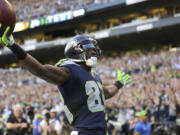 Seattle Seahawks wide receiver Ricardo Lockette celebrates after his touchdown against the Green Bay Packers on Thursday, Sept. 4, 2014, in Seattle.