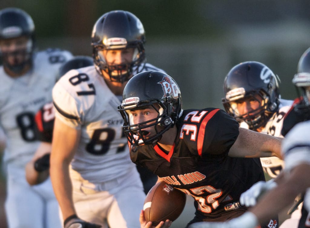 Battle Ground's Taylor Stewart runs against Skyview in the first half at District Stadium on Friday September 19, 2014.