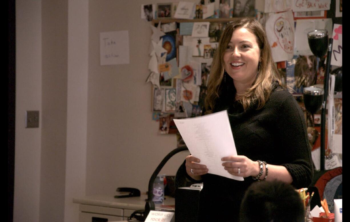 English teacher Bethany Rivard reads aloud a poem about Malcolm X written by one of her students. Rivard, who teaches several classes of seniors at Fort Vancouver High School, is one of nine finalists for this year’s Washington State Teacher of the Year Award.