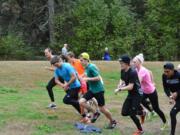 The Clark College cross country program is back at full strength after having just eight runners, including three men, last season. Here, runners from the men's and women's team run at Lewisville Park near Battle Ground.