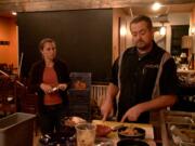 Tim and Melissa McKusker discuss their new downtown Camas restaurant Thursday morning. Located on Fourth Avenue beneath the historic Camas Hotel, the place used to be home to Harvest, the McKuskers&#039; American comfort food restaurant. This year, the couple decided to revamp the place and the menu with a new Southern theme, renaming it Miss Nola&#039;s Cafe.