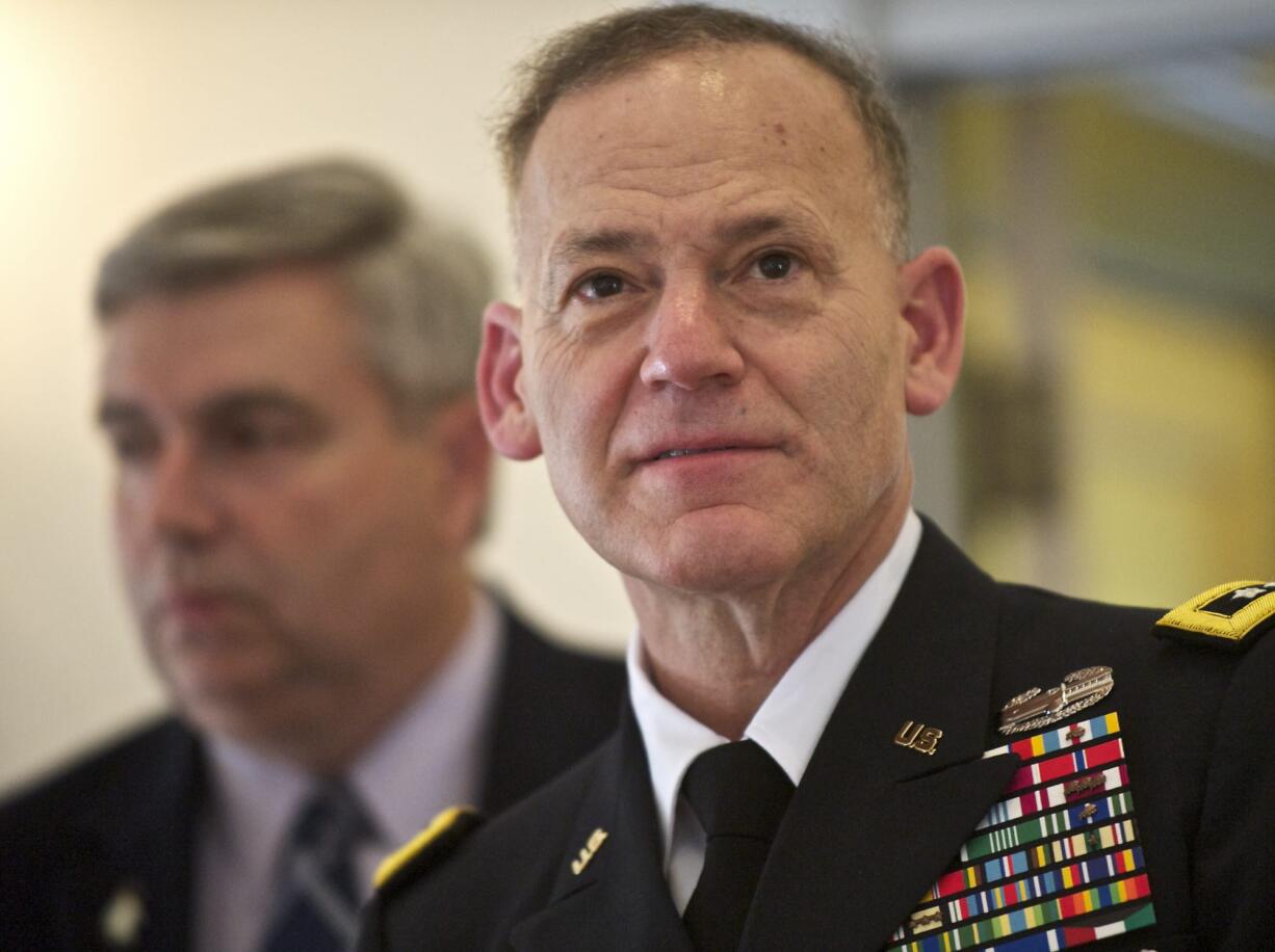 Lt. Gen. Stephen Lanza, commander of  the U.S. Army's I Corps at Joint Base Lewis-McChord, tours the Red Cross Building at the West Barracks with U.S.